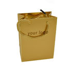 Carry Custom Paper Shopping Bags 250g a gravé promotionnel en refief avec la poignée assortie de corde de pp