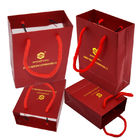 Le sac de papier de bijoux de FSC avec la poignée 250g de corde a adapté CMYK aux besoins du client imprimant le coton