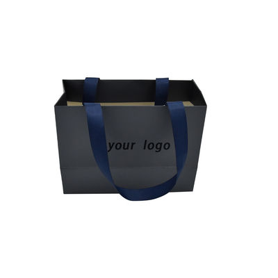 Les tailles assorties bleues ont ridé les sacs à provisions de papier faits sur commande pour la petite entreprise