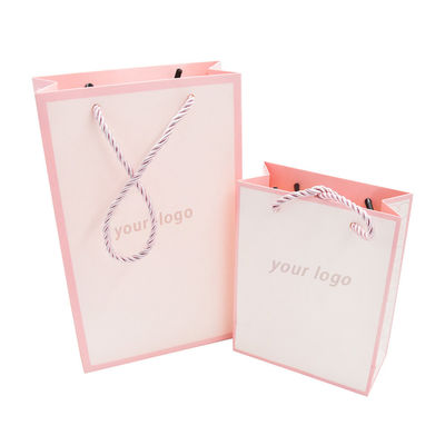 Carry Custom Paper Shopping Bags 250g a gravé promotionnel en refief avec la poignée assortie de corde de pp